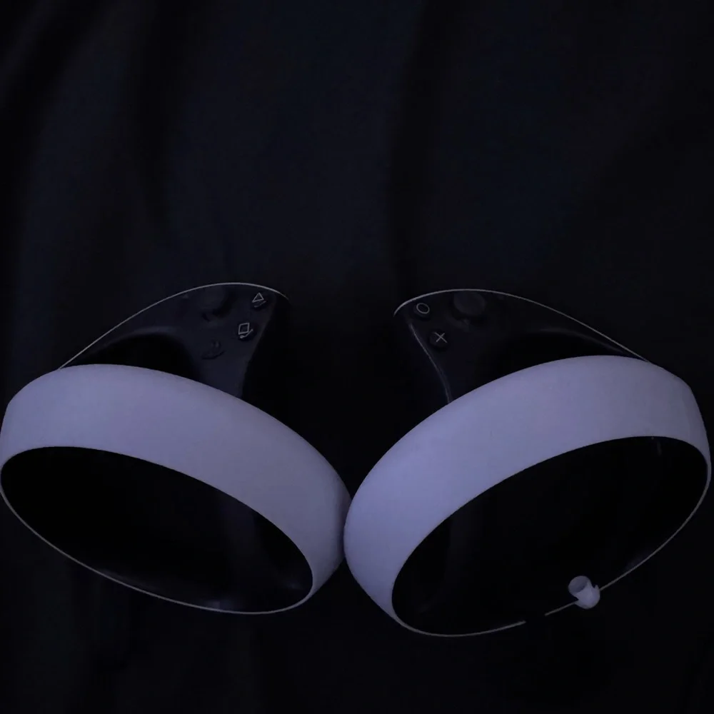 White and Black VR Headset with Controllers